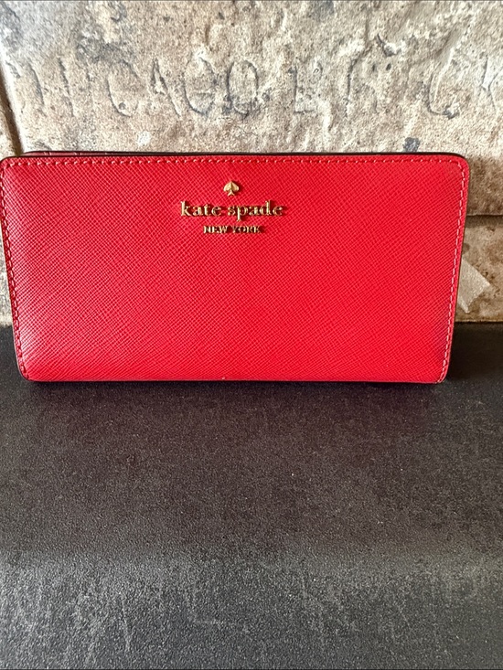 kate spade Handbags - kate spade red Saffiano zip-around wallet with gold logo